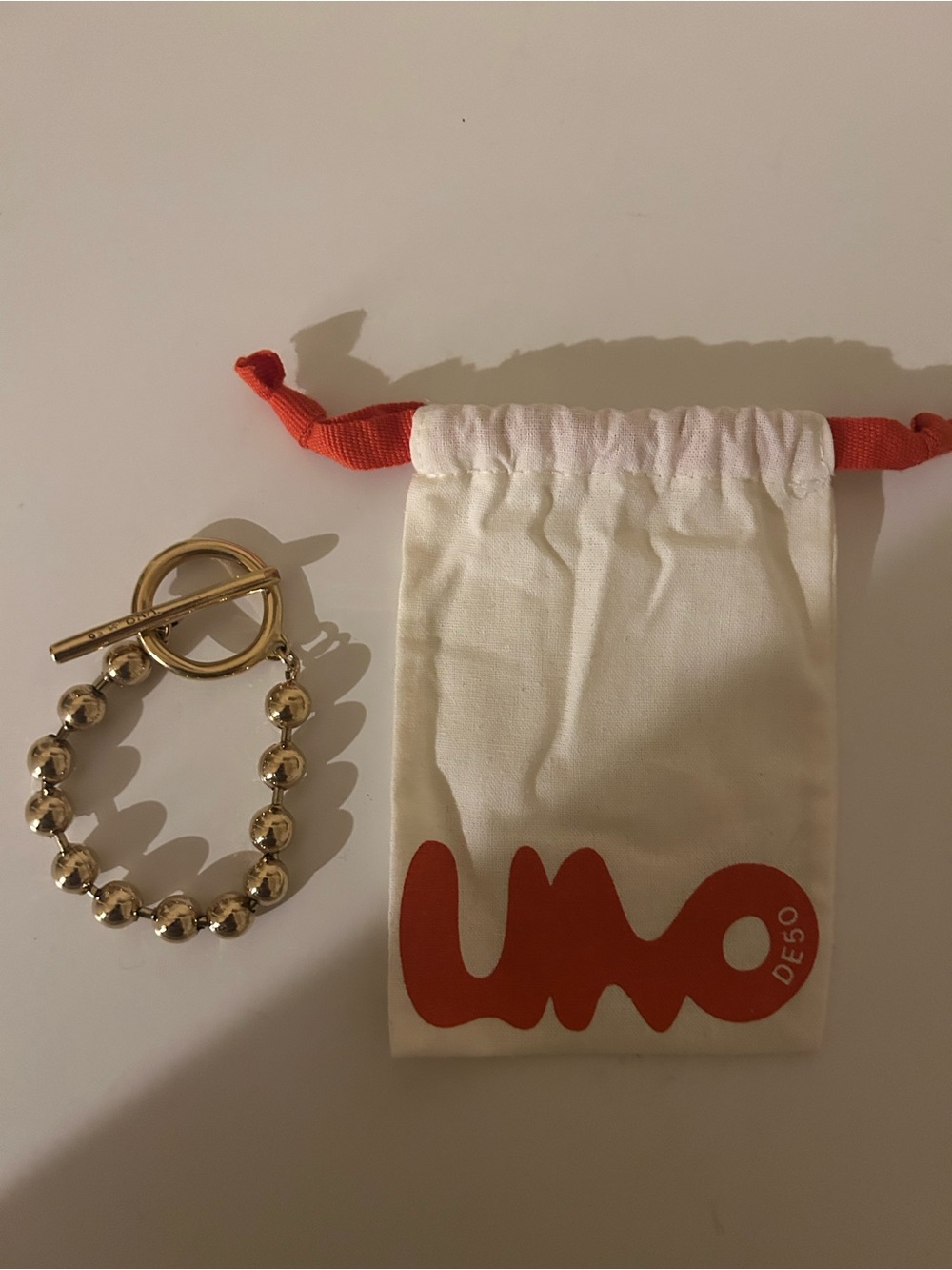 Gold Beaded Bracelet with Toggle Clasp - Uno de 50
